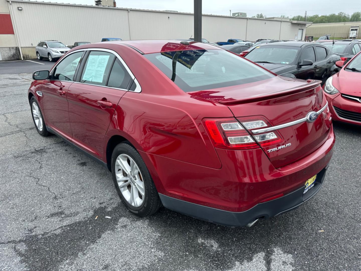 2013 RED Ford Taurus SEL FWD (1FAHP2E8XDG) with an 3.5L V6 DOHC 24V engine, 6-Speed Automatic transmission, located at 1254 Manheim Pike, Lancaster, PA, 17601, (717) 393-9133, 40.062870, -76.323273 - Photo#6